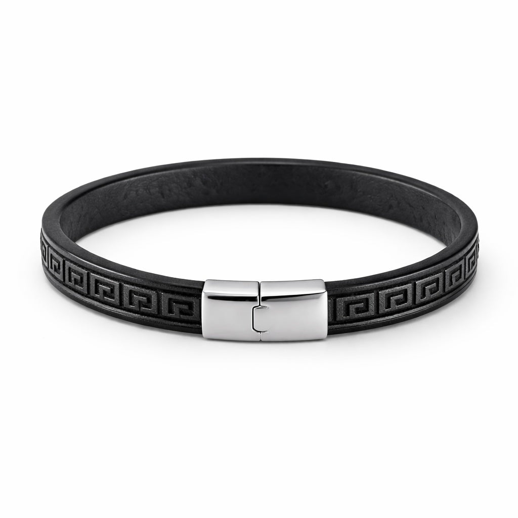 Black rubber bracelet with silver clasp on a white background