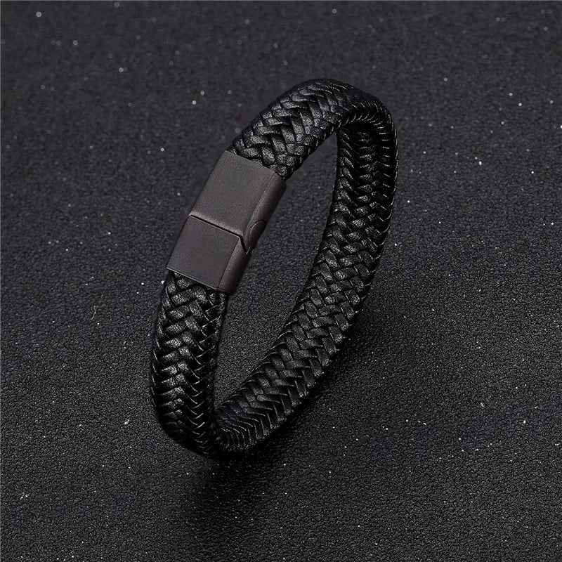 Black braided bracelet with a magnetic clasp on a dark background